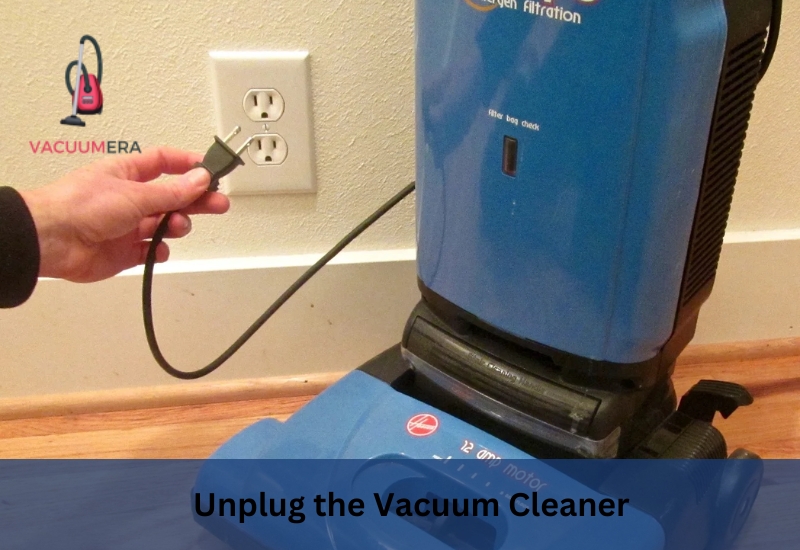 Unplug the Vacuum Cleaner